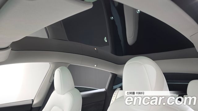 Tesla Model Y 2024 — photo 22