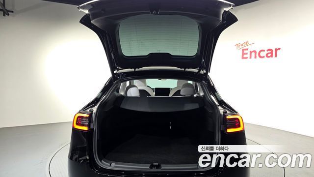 Tesla Model Y 2024 — photo 24