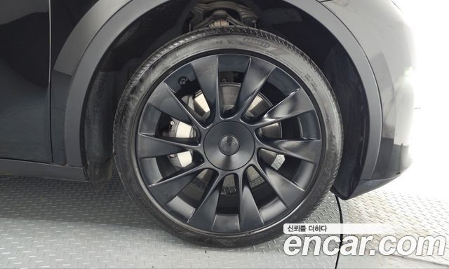 Tesla Model Y 2024 — photo 7
