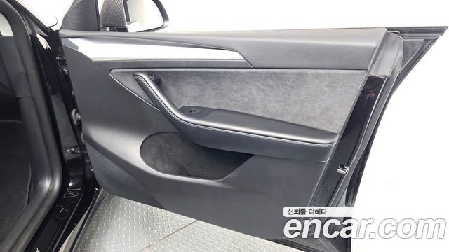 Tesla Model Y 2024 — photo 14