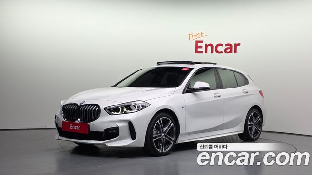 BMW 1-Series 2024 — photo 1