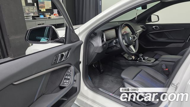 BMW 1-Series 2024 — photo 13