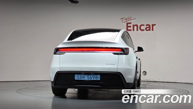 Tesla Model Y 2025 — photo 4