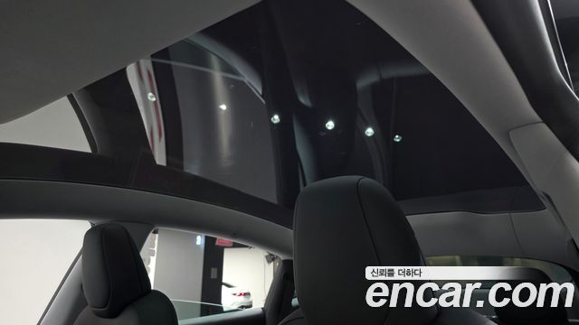 Tesla Model Y 2025 — photo 25