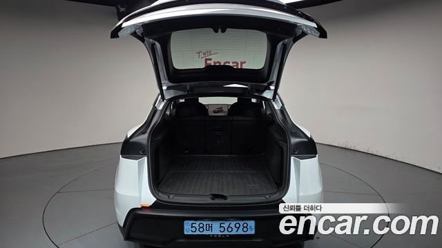 Tesla Model Y 2025 — photo 26