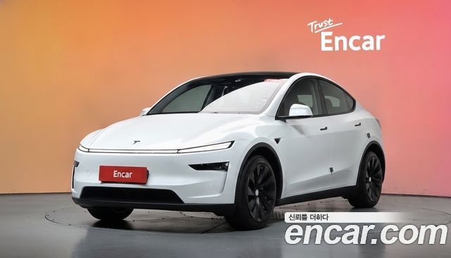 Tesla Model Y 2025 — photo 1