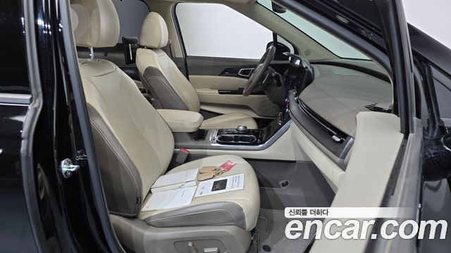 Kia Canival 2021 — photo 16