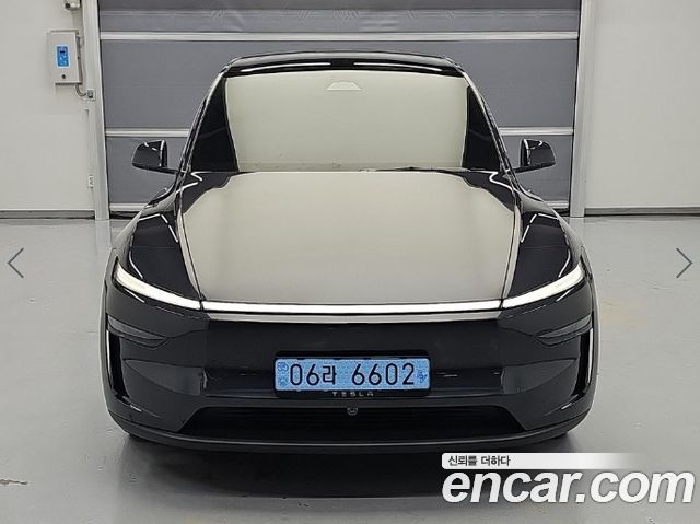 Tesla Model Y 2026 — photo 2