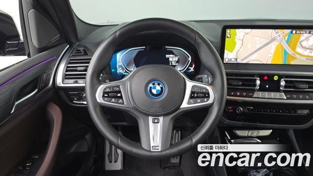 BMW iX3 2024 — photo 19