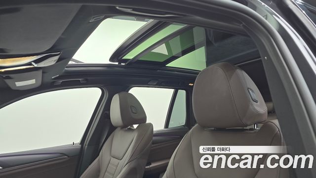 BMW iX3 2024 — photo 23