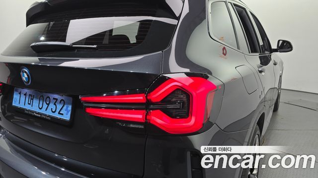 BMW iX3 2024 — photo 9
