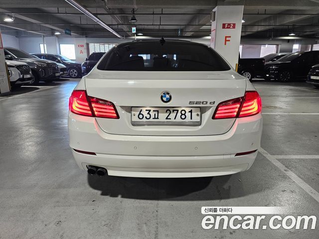 BMW 5-Series 2011 — photo 4