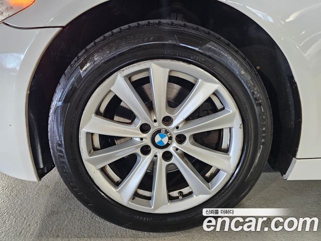BMW 5-Series 2011 — photo 14