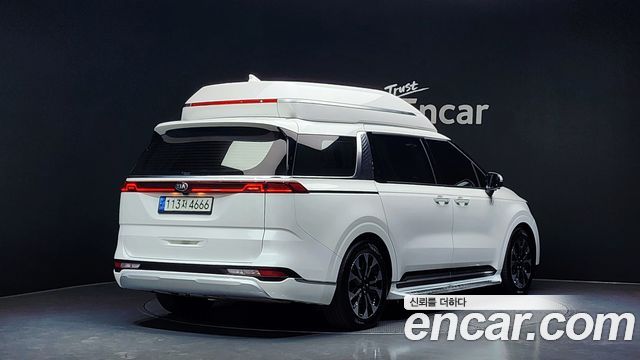 Kia Canival 2021 — photo 2