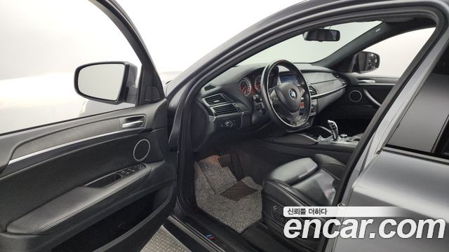 BMW X6M 2010 — photo 10