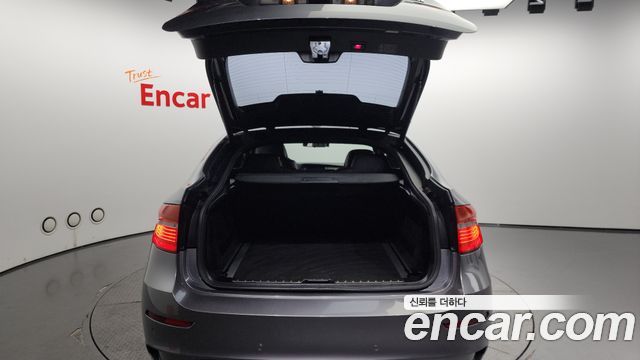 BMW X6M 2010 — photo 20