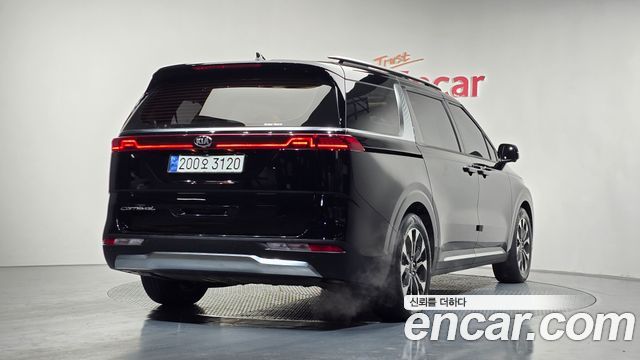 Kia Canival 2021 — photo 2