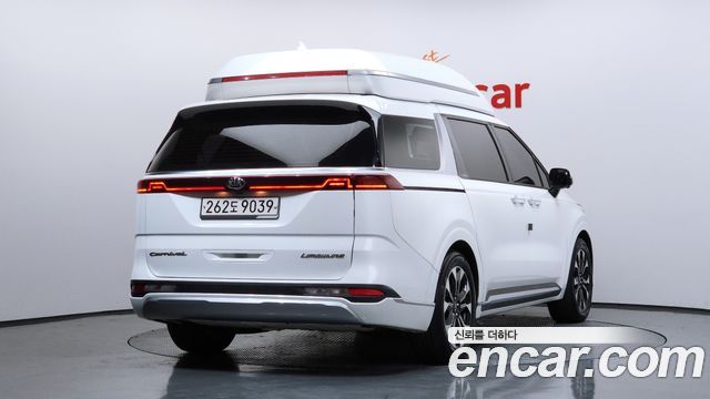 Kia Canival 2021 — photo 2