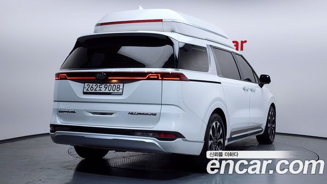 Kia Canival 2021 — photo 2