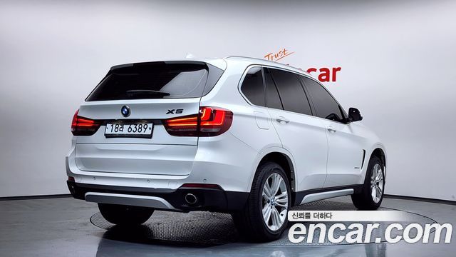 BMW X5 2015 — photo 2