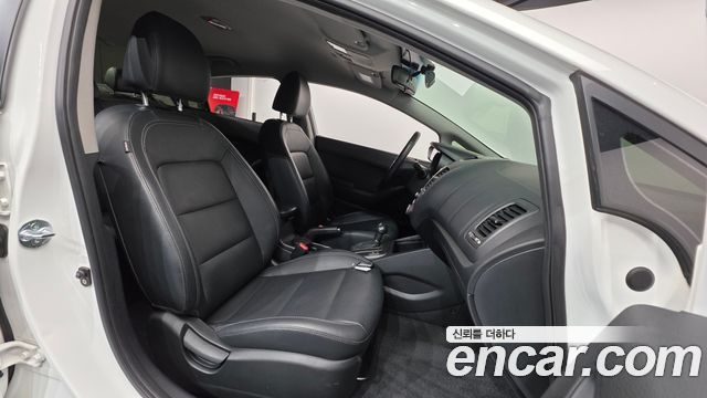 Kia K3 2013 — photo 10
