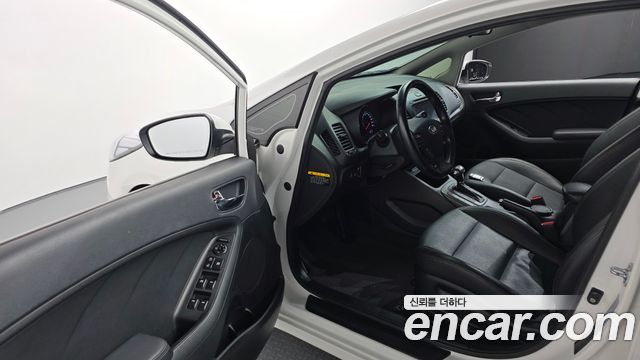 Kia K3 2013 — photo 11