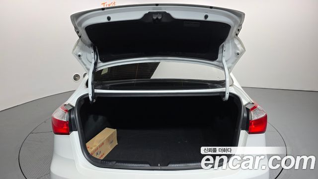 Kia K3 2013 — photo 20