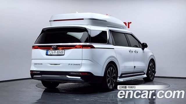 Kia Canival 2021 — photo 2