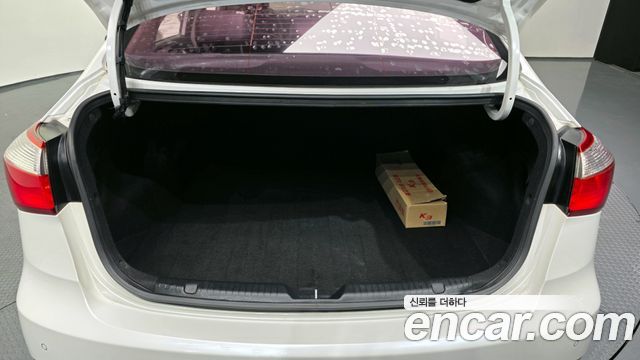 Kia K3 2015 — photo 20