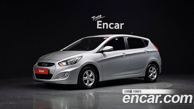 Hyundai Accent 2012 — photo 1