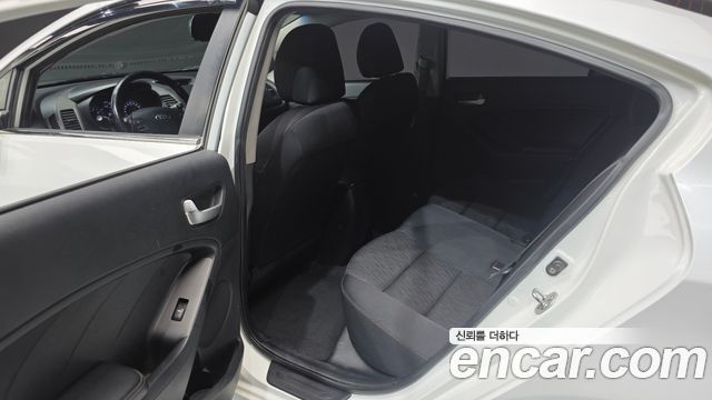 Kia K3 2013 — photo 11
