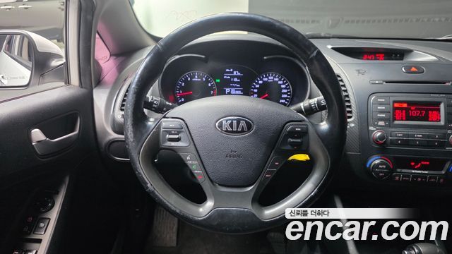 Kia K3 2013 — photo 13