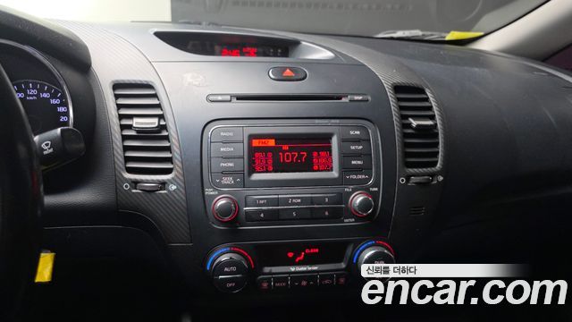 Kia K3 2013 — photo 18