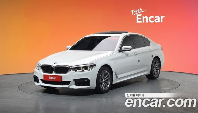 BMW 5-Series 2018 — photo 1