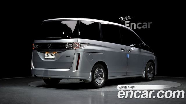 Mazda Biante 2010 — photo 2