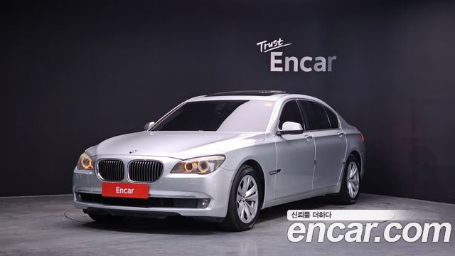 BMW 7-Series 2011 — photo 1