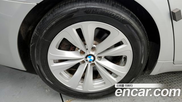 BMW 7-Series 2011 — photo 5