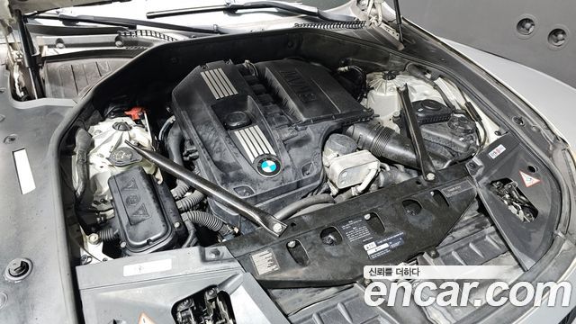 BMW 7-Series 2011 — photo 6