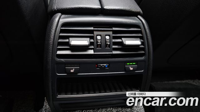 BMW 7-Series 2011 — photo 18