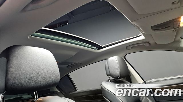 BMW 7-Series 2011 — photo 19