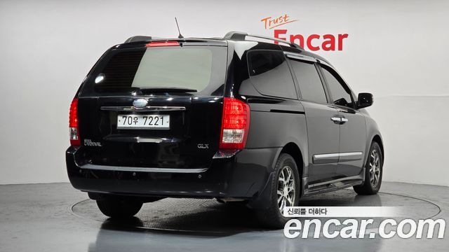 Kia Canival 2014 — photo 2