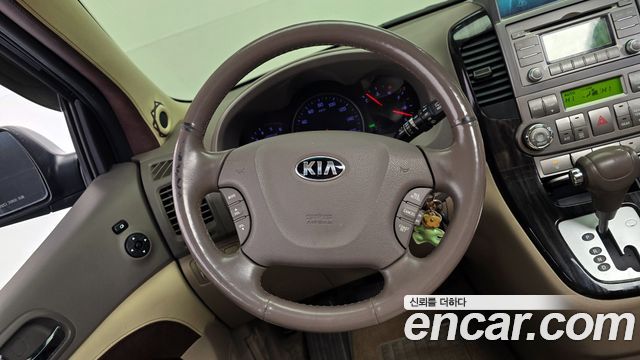 Kia Canival 2014 — photo 13