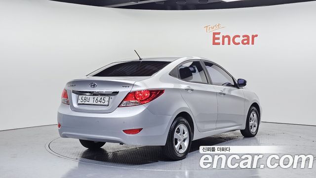 Hyundai Accent 2012 — photo 2