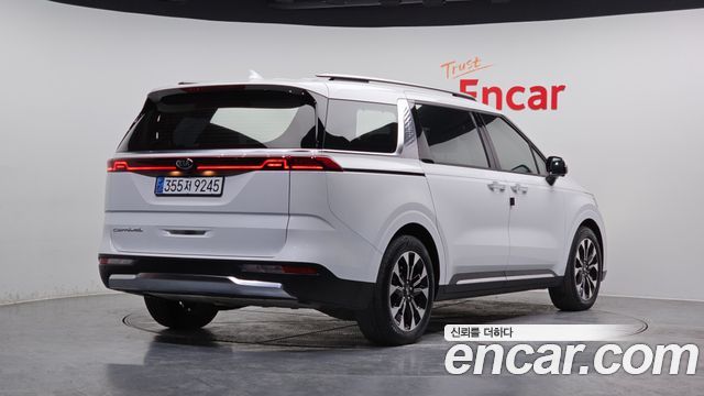 Kia Canival 2021 — photo 2