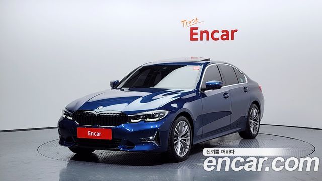 BMW 3-Series 2021 — photo 1