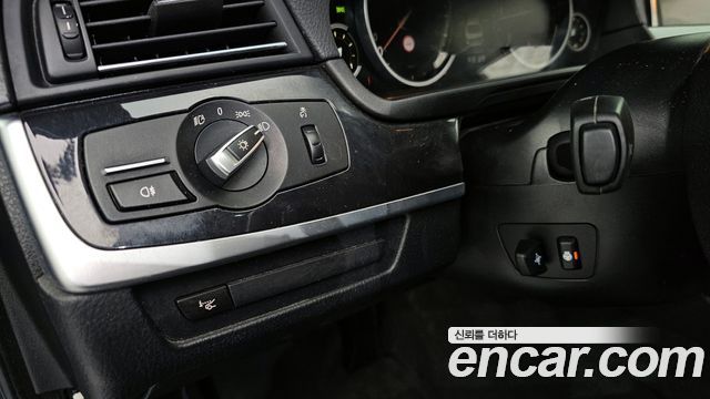 BMW 5-Series 2014 — photo 14