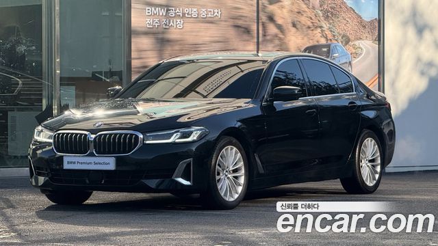 BMW 5-Series 2023 — photo 1