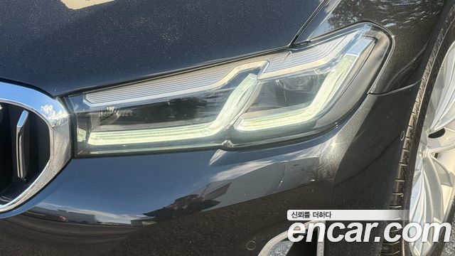 BMW 5-Series 2023 — photo 12