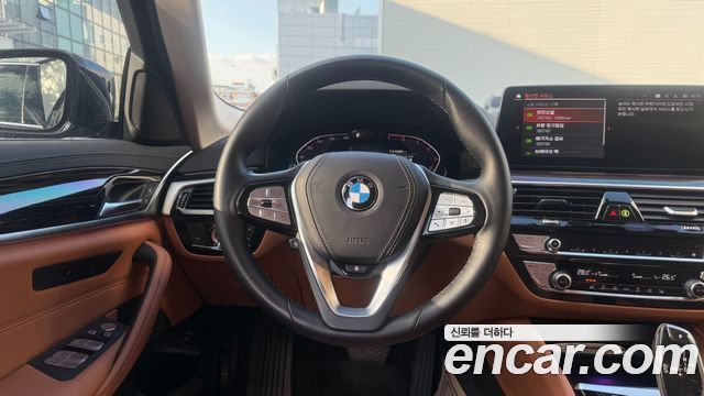 BMW 5-Series 2023 — photo 19