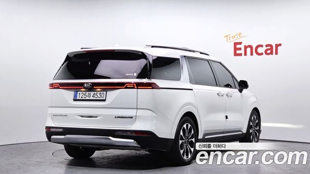 Kia Canival 2021 — photo 2